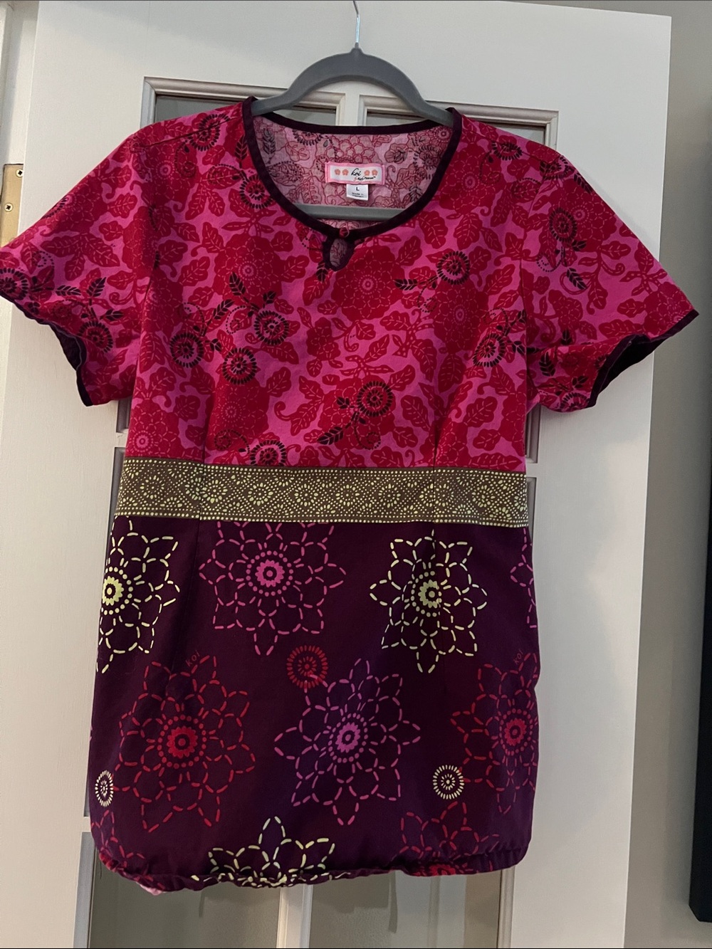 Koi Bright Pink and Plum Floral Women’s Scrub Top with Back Tie and Side Pockets